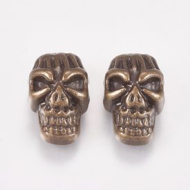 Bronz Színű Koponya Közdarab Köztes 15x9mm