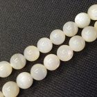 Ezüst Csíkos Krém Színű Kagyló Gyöngy 8mm